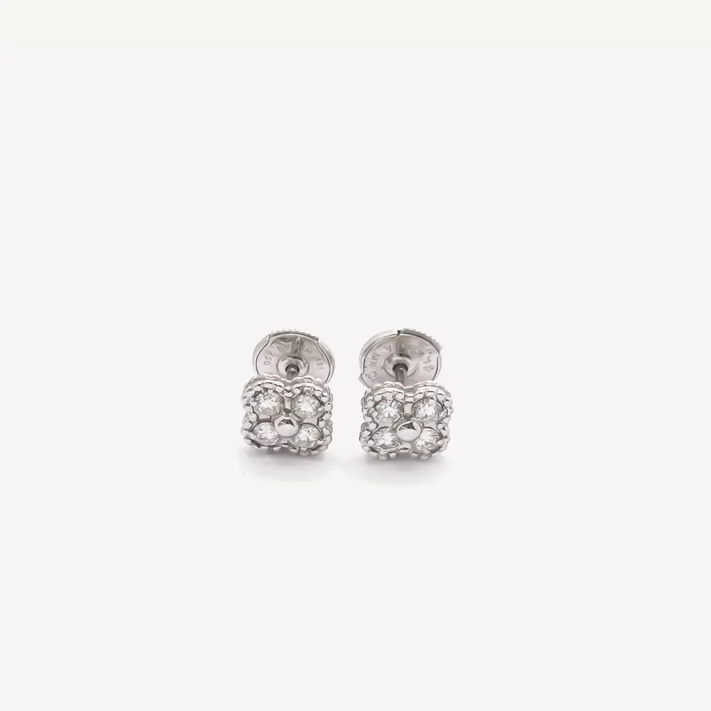 Boucles d'oreilles fleurette Van Cleef & Arpels or blanc diamants